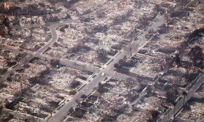 FILE PHOTO. Aerial view of homes destroyed in wildfires in Pacific Palisades, California © Getty Images / Mario Tama