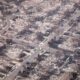 FILE PHOTO. Aerial view of homes destroyed in wildfires in Pacific Palisades, California © Getty Images / Mario Tama