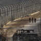 FILE PHOTO: Israeli soldiers walk a long the border with Syria as seen from the Israeli side of the border on December 9, 2024 in Golan Heights. © Amir Levy / Getty Images