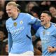 Manchester City’s English midfielder #47 Phil Foden (R) celebrates scoring the team’s third goal with Manchester City’s Norwegian striker #09 Erling Haaland during the English Premier League football match between Manchester City and Chelsea at the Etihad Stadium in Manchester, north west England, on January 25, 2025. Manchester City won the match 3-1. (Photo by Oli SCARFF / AFP)