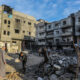 Palestinians inspect the ruins of a residential building after an Israeli strike on Khan Yunis, Gaza on January 5, 2025 © Abed Rahim Khatib/Anadolu via Getty Images