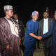 President Bola Tinubu shakes his Chief of Staff, Femi Gbajabiamila, and other top government officials upon his arrival to Abuja from Tanzania on January 28, 2025.