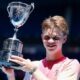 Switzerland’s Henry Bernet poses with the trophy after his victory against USA’s Benjamin Willwerth in their junior boys’ singles final match on day fourteen of the Australian Open tennis tournament in Melbourne on January 25, 2025. (Photo by Martin KEEP / AFP) / — IMAGE RESTRICTED TO EDITORIAL USE – STRICTLY NO COMMERCIAL USE —