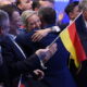 Alice Weidel (R), co-leader and chancellor candidate of the far-right Alternative for Germany (AfD), hugs AfD co-leader Tino Chrupalla at AfD headquarters after initial results in snap federal parliamentary elections on February 23, 2025 in Berlin, Germany. © Sean Gallup/Getty Images