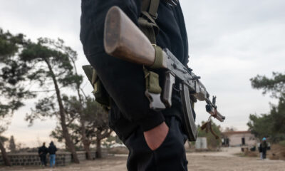 FILE PHOTO: Hayat Tahrir al-Sham (HTS) fighters patrol in the city of Homs, Syria, January 22, 2025. © Getty Images / Spencer Platt