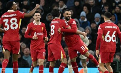 Liverpool’s Hungarian midfielder #08 Dominik Szoboszlai celebrates scoring the team’s second goal with Liverpool’s Egyptian striker #11 Mohamed Salah during the English Premier League football match between Manchester City and Liverpool at the Etihad Stadium in Manchester, north west England, on February 23, 2025. (Photo by Paul ELLIS / AFP)