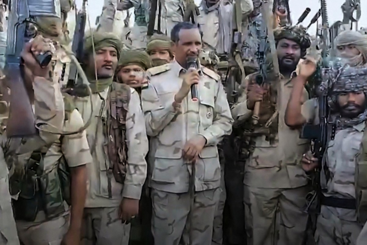 (FILES) An image grab taken from a handout video posted on the Sudanese paramilitary Rapid Support Forces (RSF) page on Twitter, rebranded as X, on July 28, 2023, shows its commander Mohamed Hamdan Daglo addressing RSF fighters at an undisclosed location. (Photo by Rapid Support Forces (RSF) / AFP)