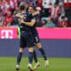 Bochum’s Costa Rican defender #02 Cristian Gamboa and Bochum’s Macedonian midfielder #17 Agon Elezi celebrate after the German first division Bundesliga football match between Bayern Munich and VfL Bochum in Munich, southern Germany, on March 8, 2025. (Photo by Alexandra BEIER / AFP)