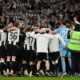 Newcastle United’s players celebrate after winning the English League Cup final football match between Liverpool and Newcastle United at Wembley Stadium, north-west London on March 16, 2025. Newcastle United wins English League Cup 2 -1 against Liverpool. (Photo by Glyn KIRK / AFP)